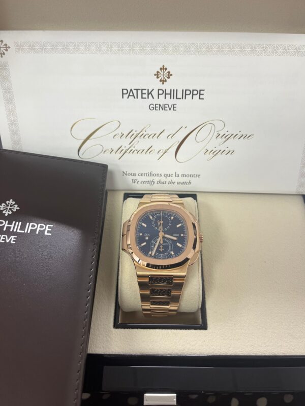 Patek Philippe Nautilus Travel Time Chronograph (Ref# 5990/1R-001) - Image 9